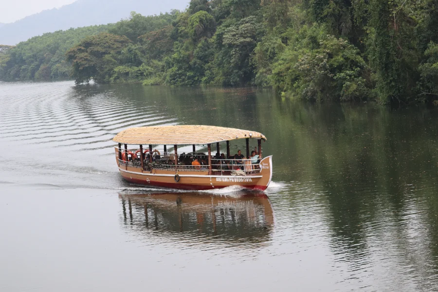 Boat cruise on the Bhoothathankettu reservoir surrounded by forest